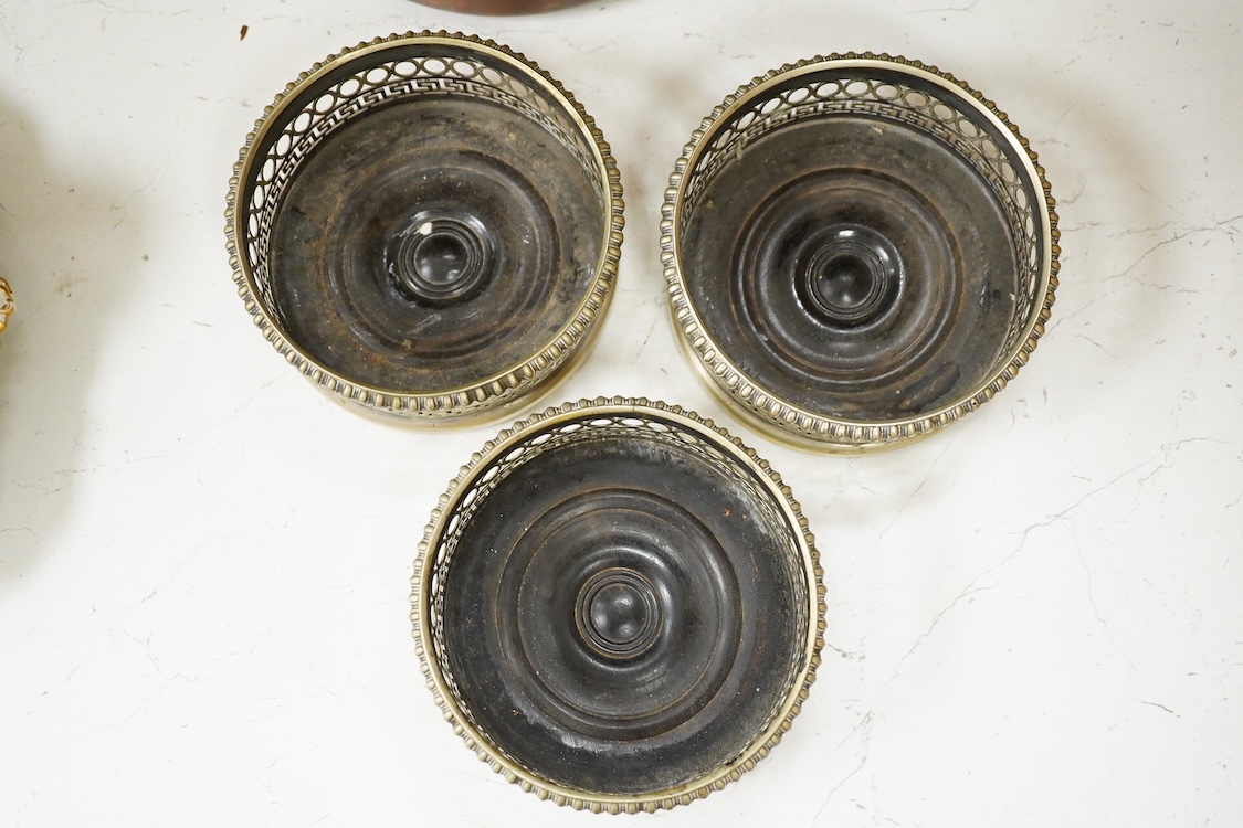 Three plated coasters, 13cm diameter